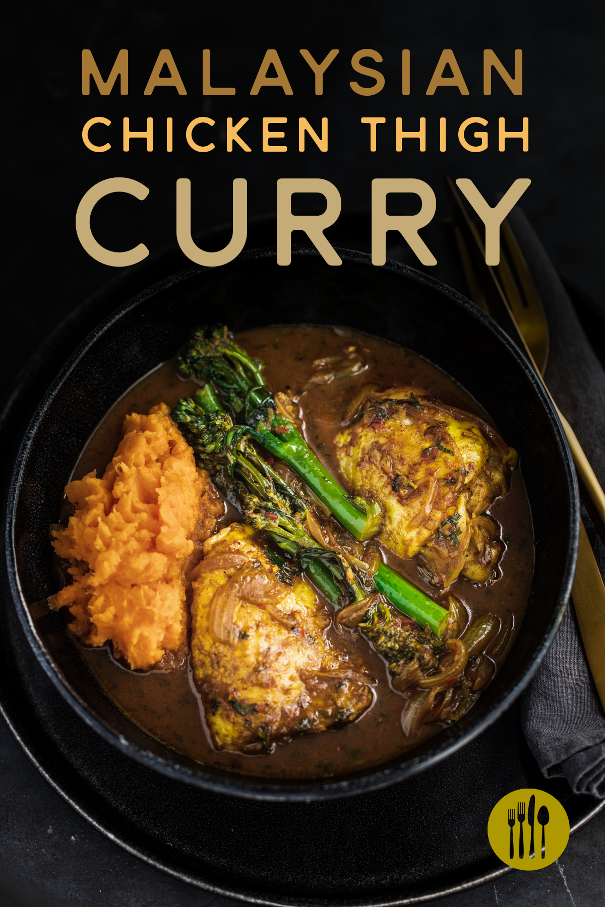 Malaysian Chicken Thigh Curry with broccoli and sweet potato in a black bowl