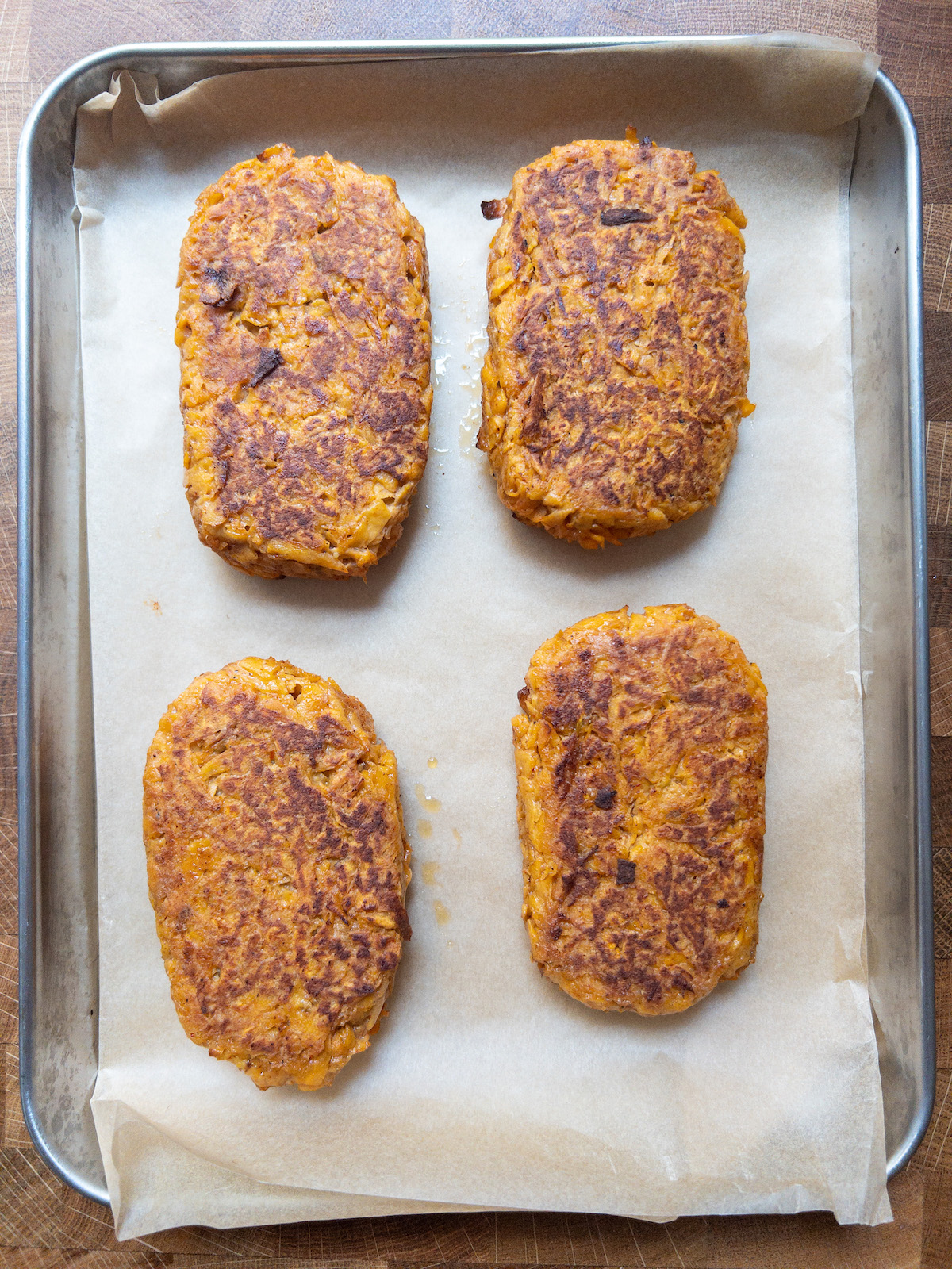 Sweet potato hash browns on a silver tray