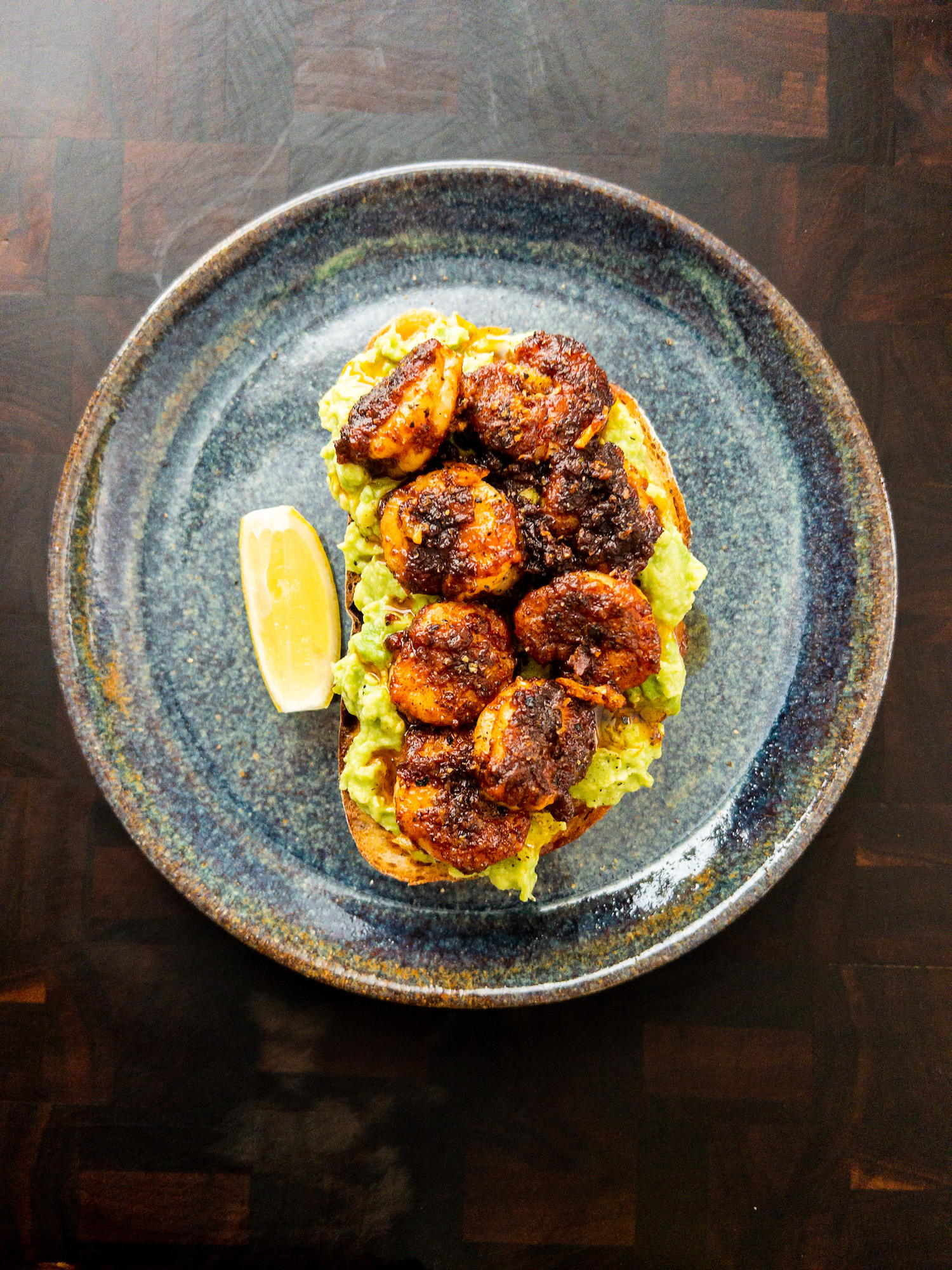 Garlic shrimp on avocado toast